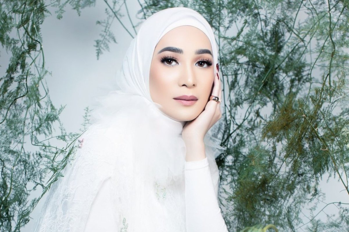 Rien Wartia Trigina Hijab Manis Cerai